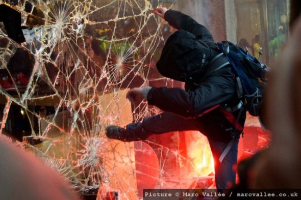 LONDON, UNITED KINGDOM – 10.11.10. Student protesters and police clash outside the Conservative Party headquarters at Millbank in central London on Wednesday 10th November 2010. Early in the day 50,000 students and supporters marched against the governments plans to rises tuition fees to £9,000 per year. (Photo by Marc Vallée/marcvallee.co.uk) © Marc Vallée, 2010. All rights reserved.